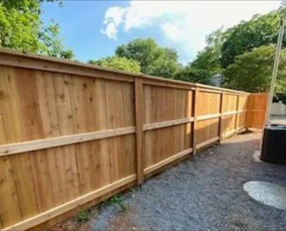 Cedar privacy fence with cap and trim